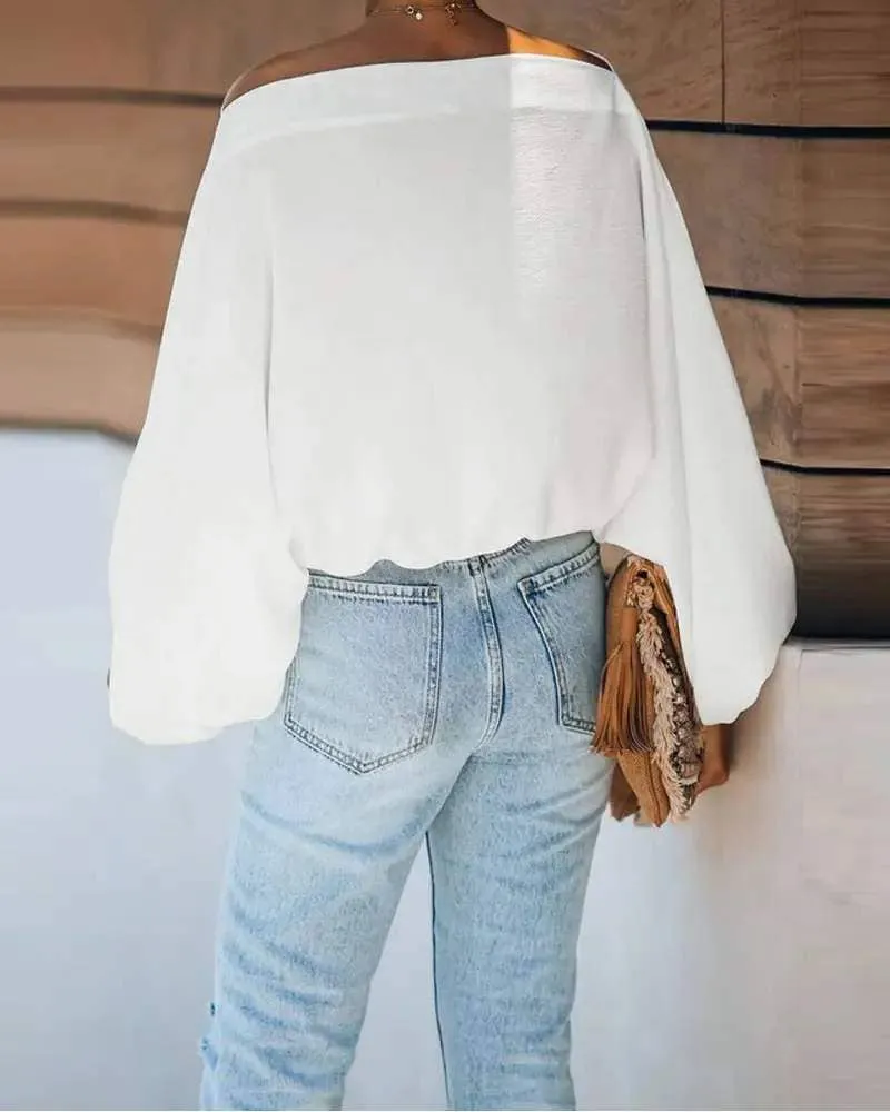 Lantern sleeve skew neck top